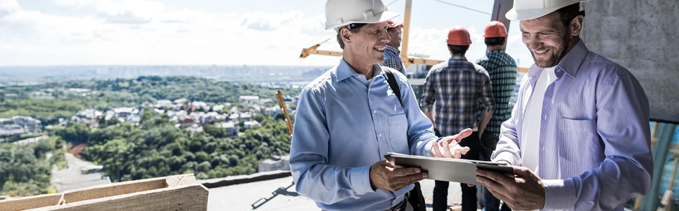 construction foreman explaining clock-in and clock-out procedures to a contractor