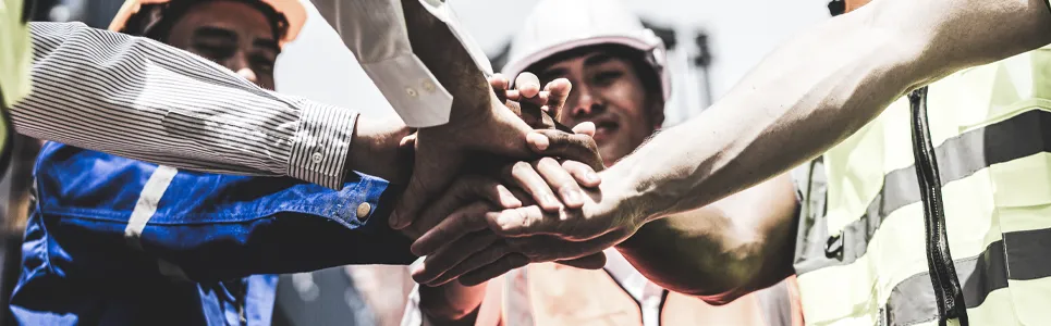 construction workers on a jobsite getting ready to start their day