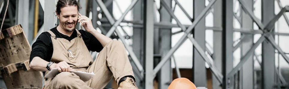 contractor-taking-a-personal-call-while-at-work